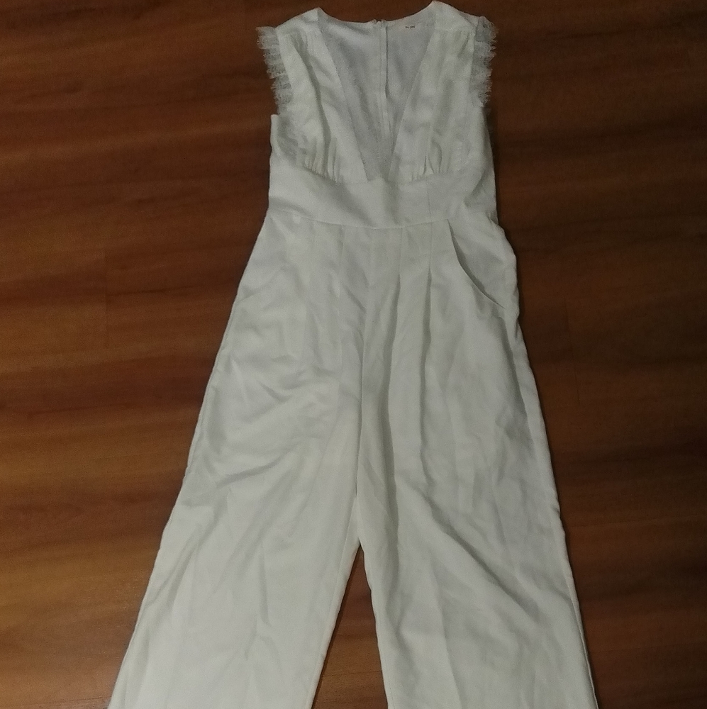 Women's size med white pants romper